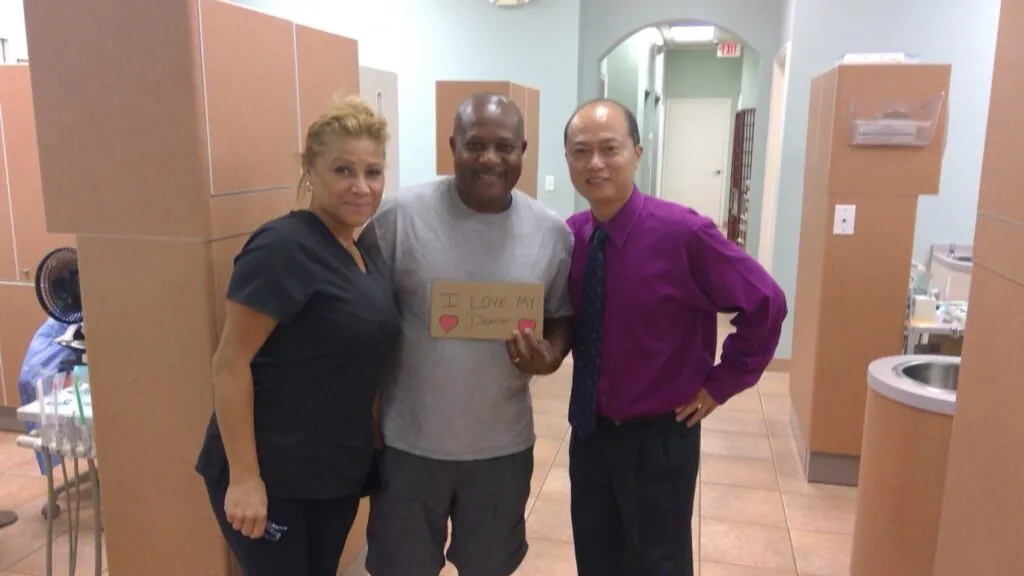 Dr. William Ma with a patient