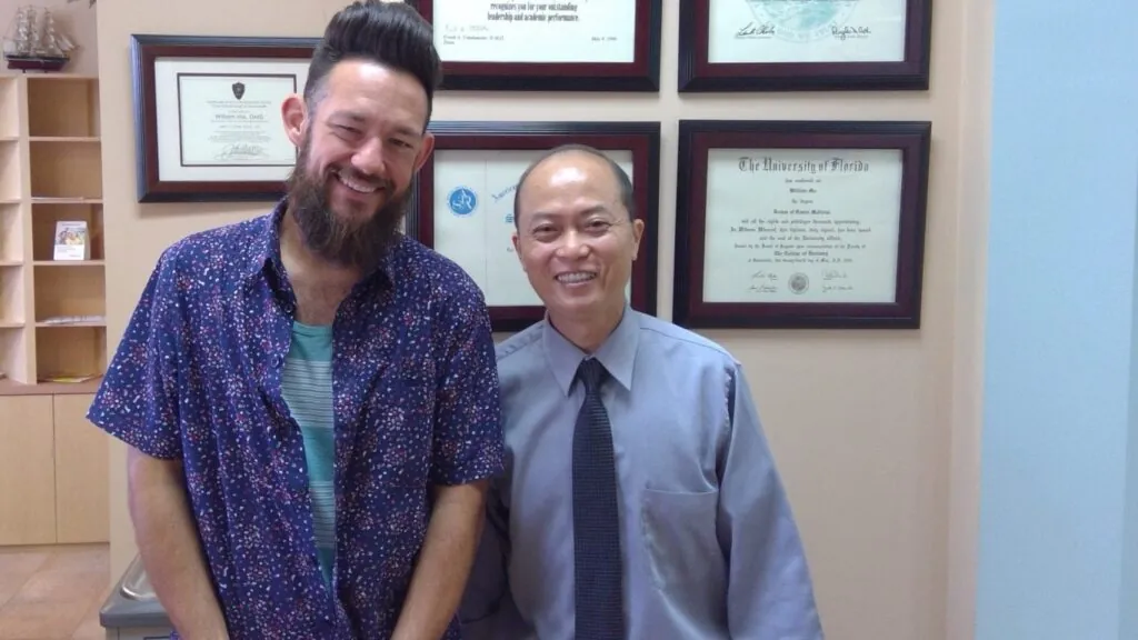 Dr. William Ma smiling with a patient