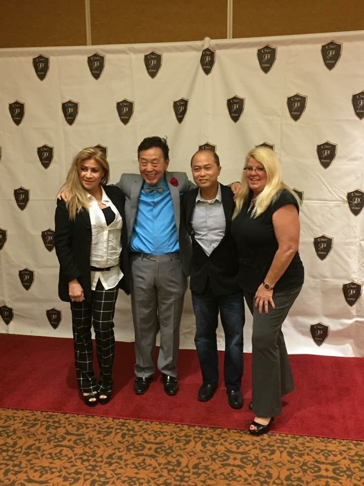 Our team with Dr. Chao on the "dental red carpet" at the Chao Pinhole® Surgical Technique Seminar in 2016