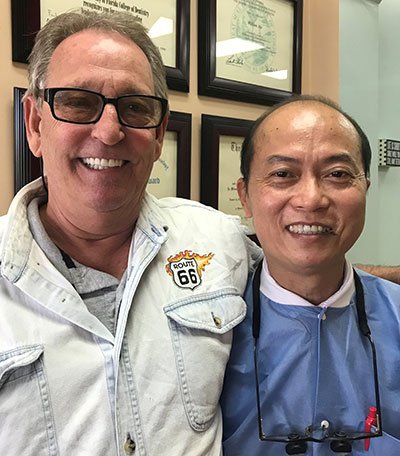 Dr. William Ma with dental implant patient
