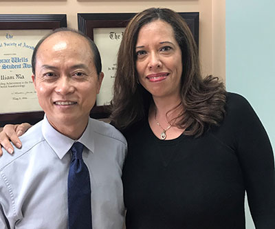 Dr. William Ma with dental implant patient